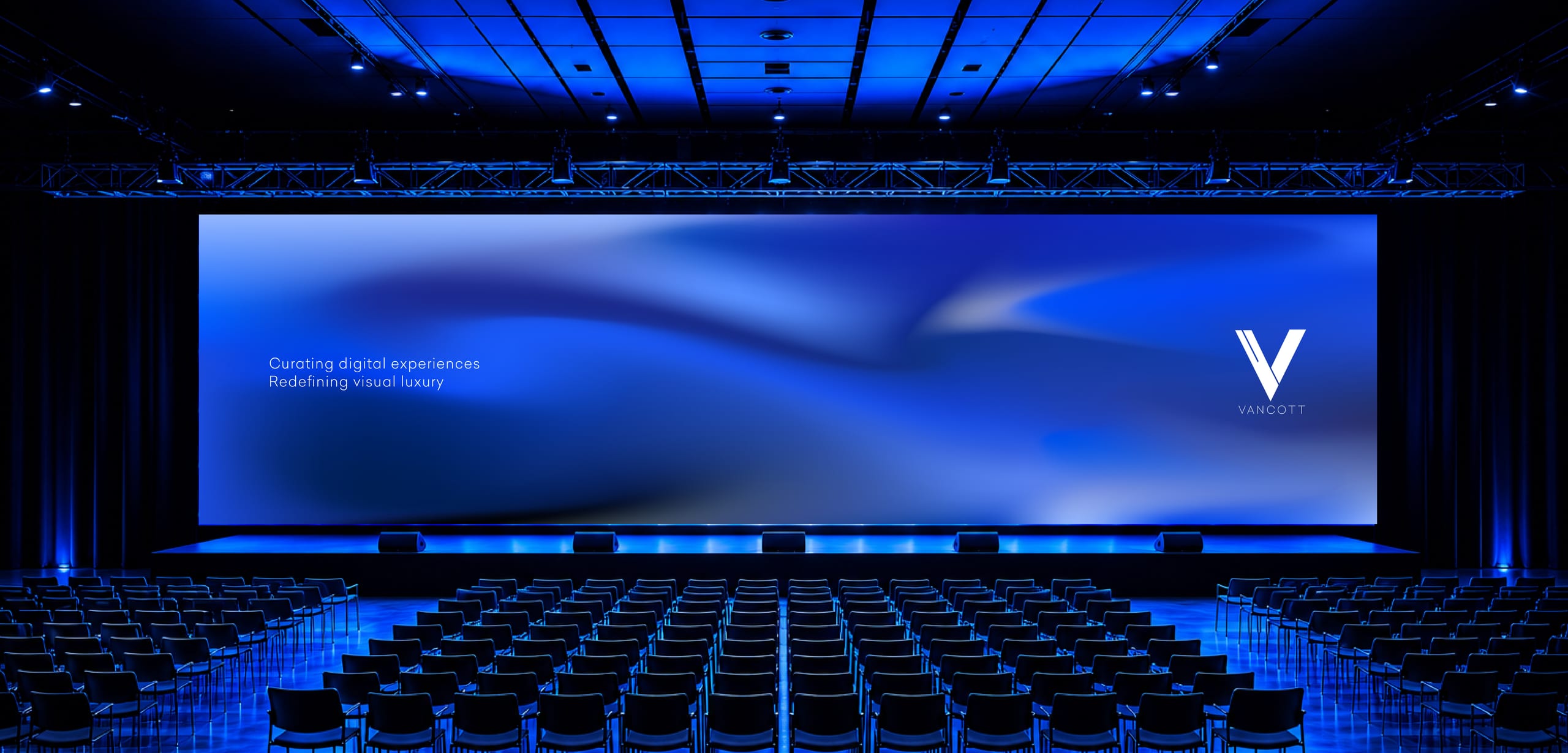 A VANCOTT LED wall lighting a full auditorium